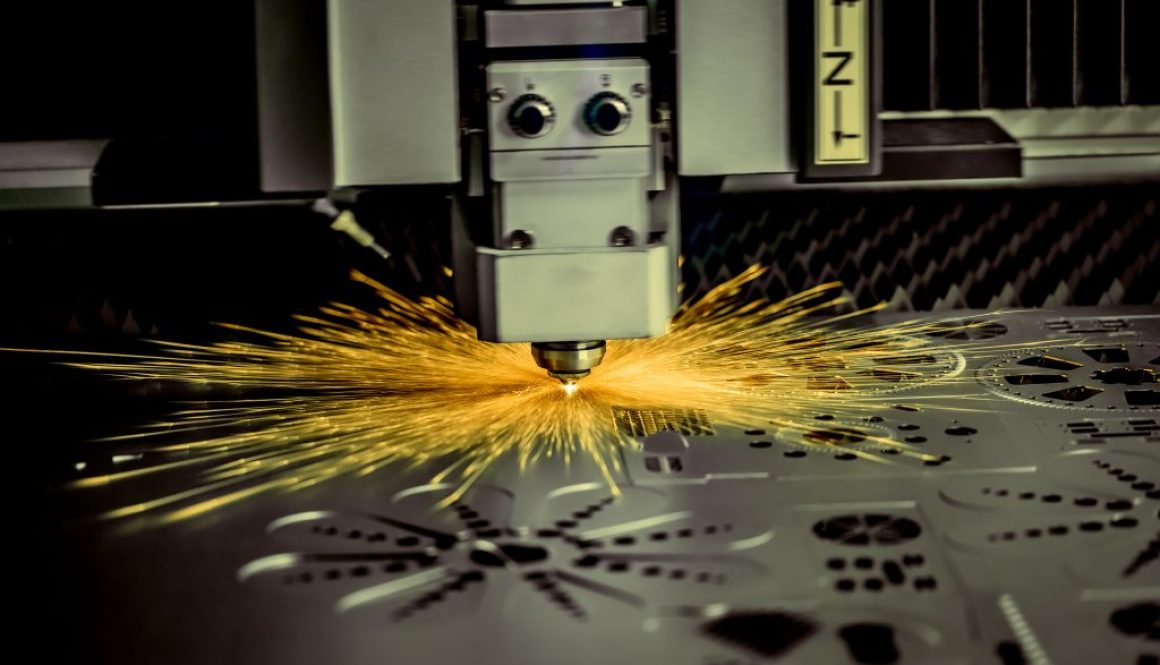 CNC Laser cutting of metal, modern industrial technology. .